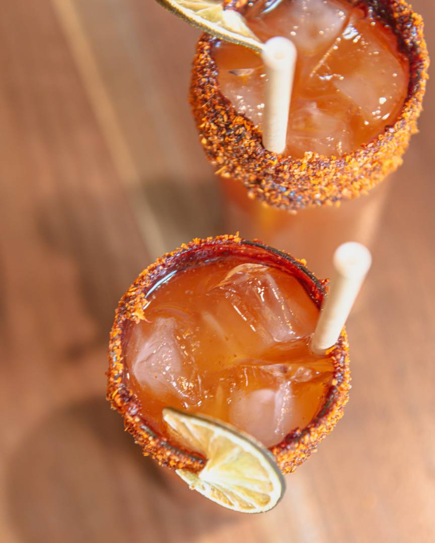 Top down view of Michelada cocktails with lime