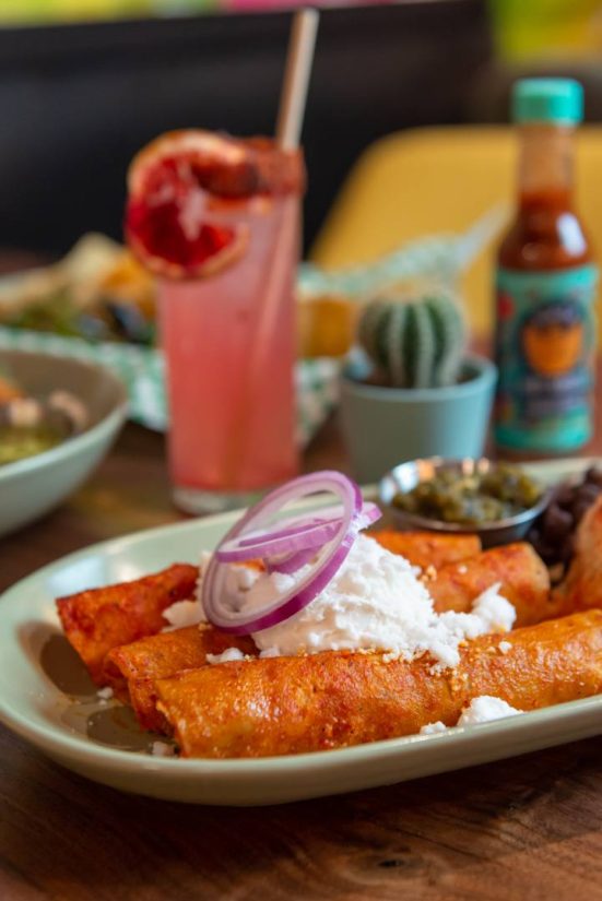 Vegan enchiladas with red onion