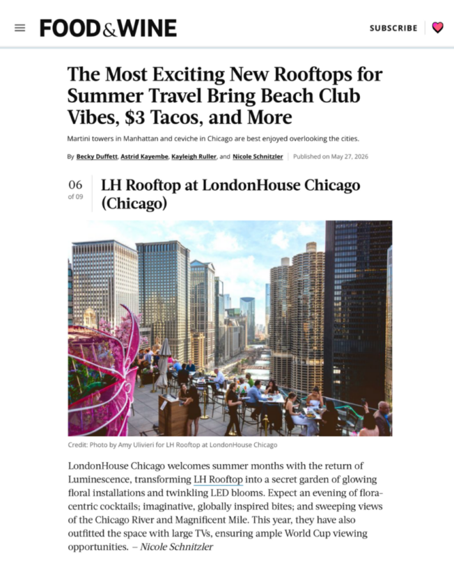 A screenshot of a Food & Wine article featuring LH Rooftop at LondonHouse Chicago as one of the “Most Exciting New Rooftops for Summer Travel.” The article includes a photo overlooking the Chicago River and skyline from the rooftop during the Luminescence floral light installation, with guests dining and gathering at sunset.